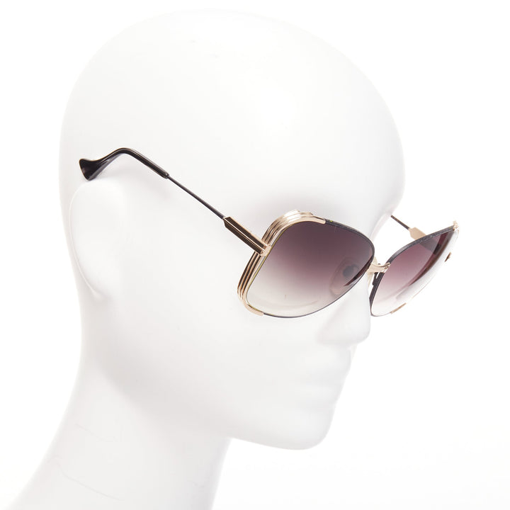 DITA Mariposa black gold metallic sides frame logo end butterfly sunnies