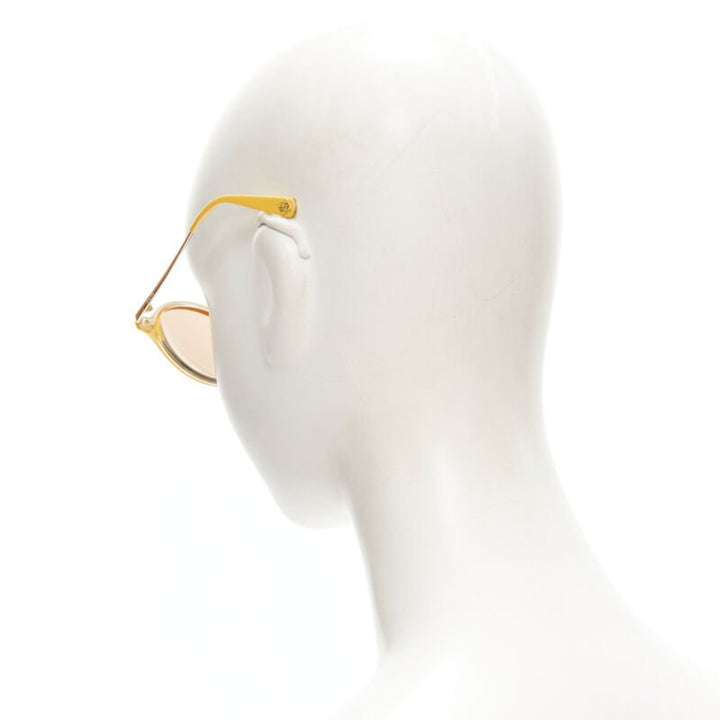 LOEWE SLW450 48 23 L03X yellow round frame brown tint sunglasses
