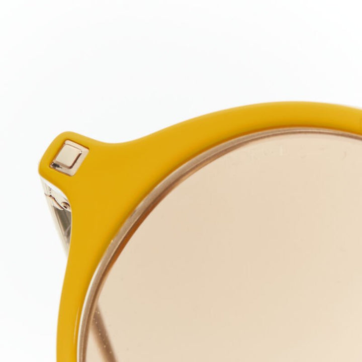 LOEWE SLW450 48 23 L03X yellow round frame brown tint sunglasses