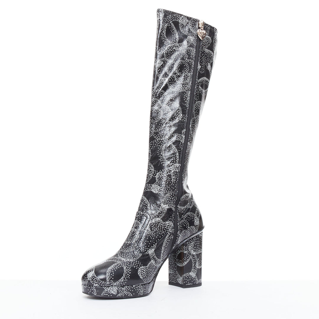 CHANEL 23A Runway white black CC camellia dotted logo print tall boots EU39