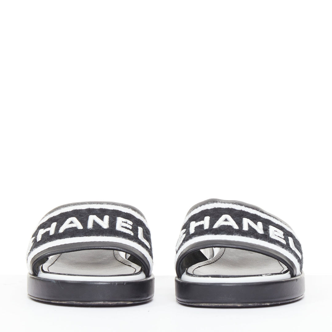 CHANEL 2021 Runway black white logo embroidered lambskin CC mule sandals EU35.5