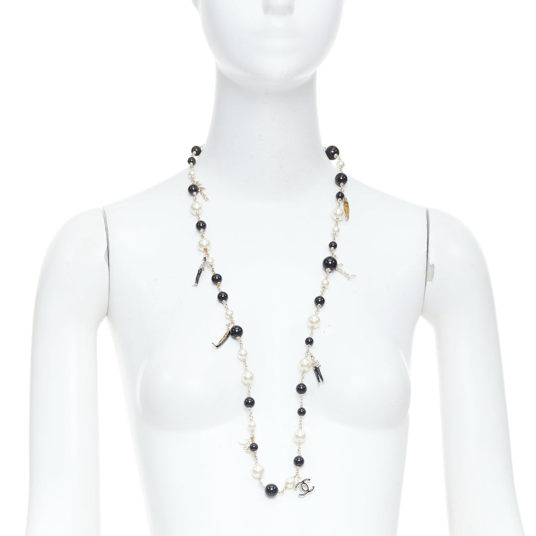 CHANEL 10C Runway CC Logo Faux Pearl Sautoir coco figurine charm necklace
