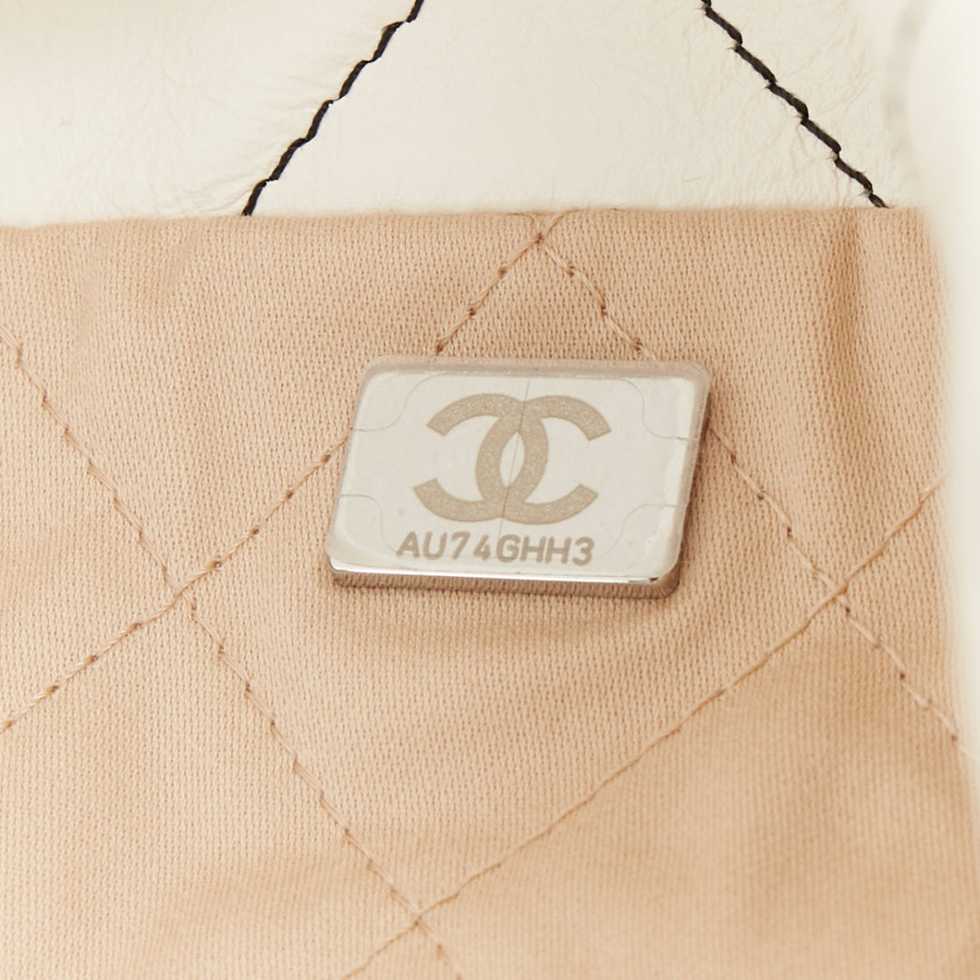 CHANEL 2022 Runway 22 Medium white quilted shiny calfskin silver hobo bag