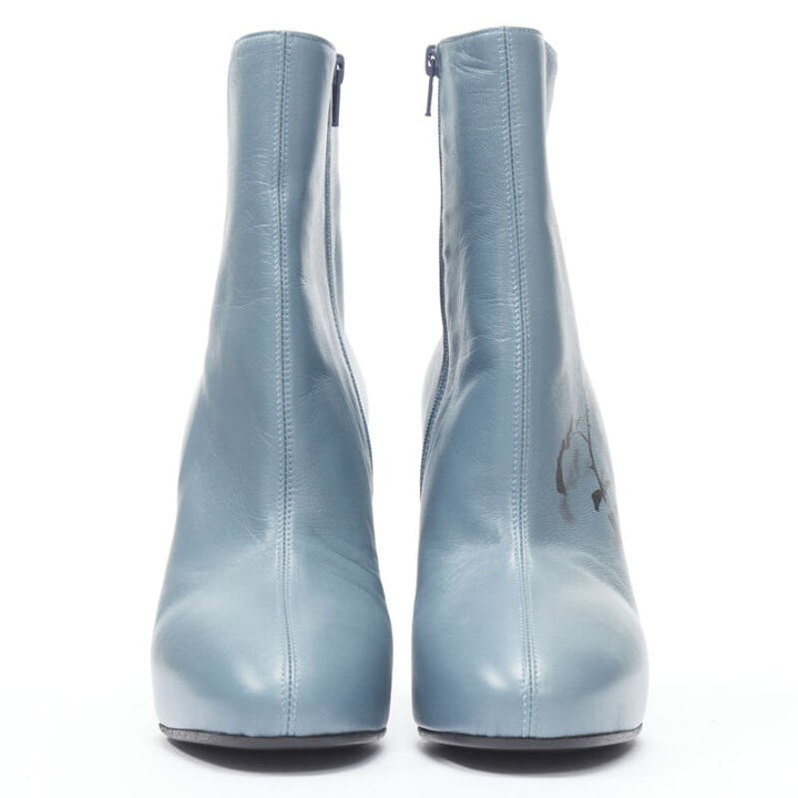 Female mannequin wearing Dries Van Noten Runway Blue Leather Women Boots in Size EU36 | Available at JHROP