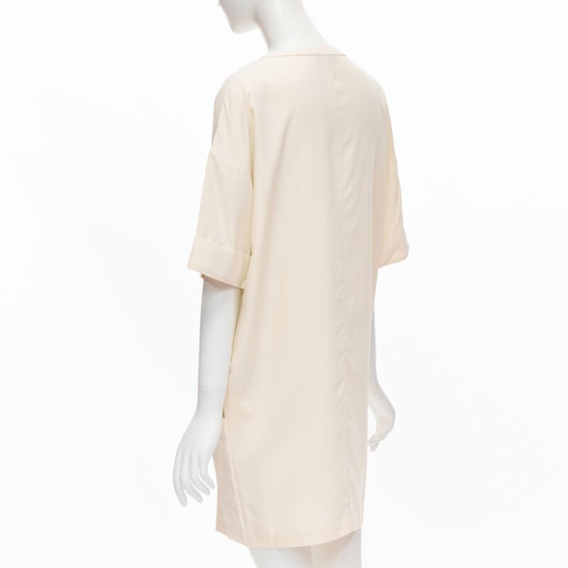 the row cream dress THE ROW Size 2 Cream Viscose Elastane Tunic Knee-Length Dress For Sale at 1stDibs