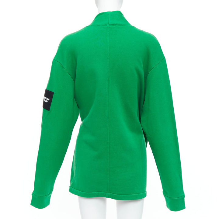 Female mannequin wearing Ambush WKSP Green Cotton Women Coat in Size  S | Available at JHROP