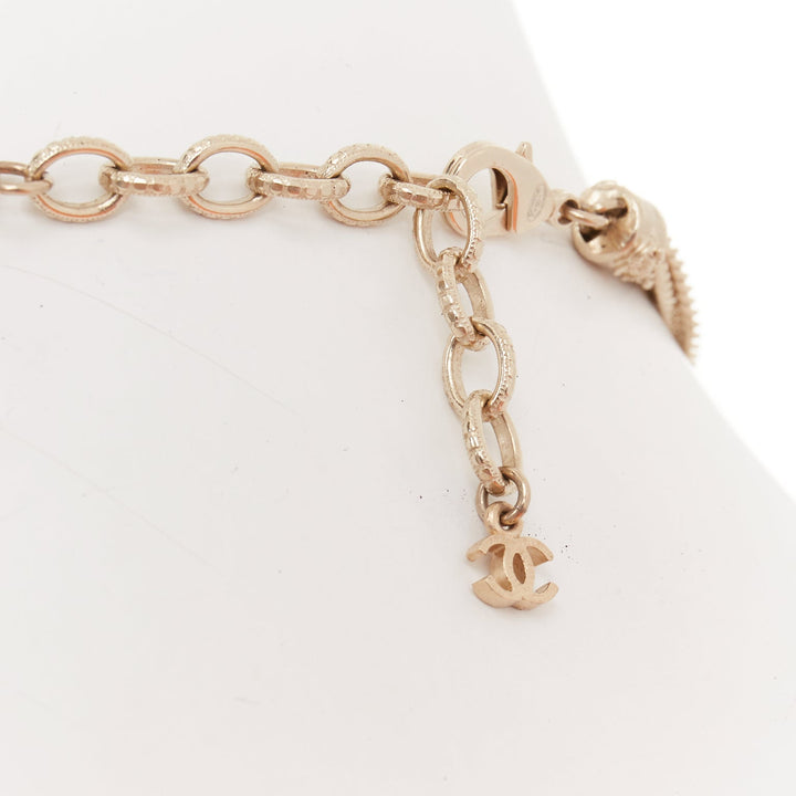 CHANEL A16P gold tone Camellia floral pearl fringe CC station sautoir necklac