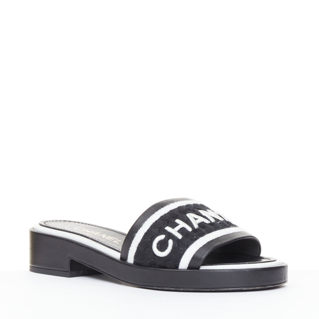 CHANEL 2021 Runway black white logo embroidered lambskin CC mule sandals EU35.5