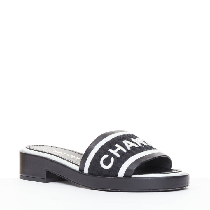 CHANEL 2021 Runway black white logo embroidered lambskin CC mule sandals EU35.5