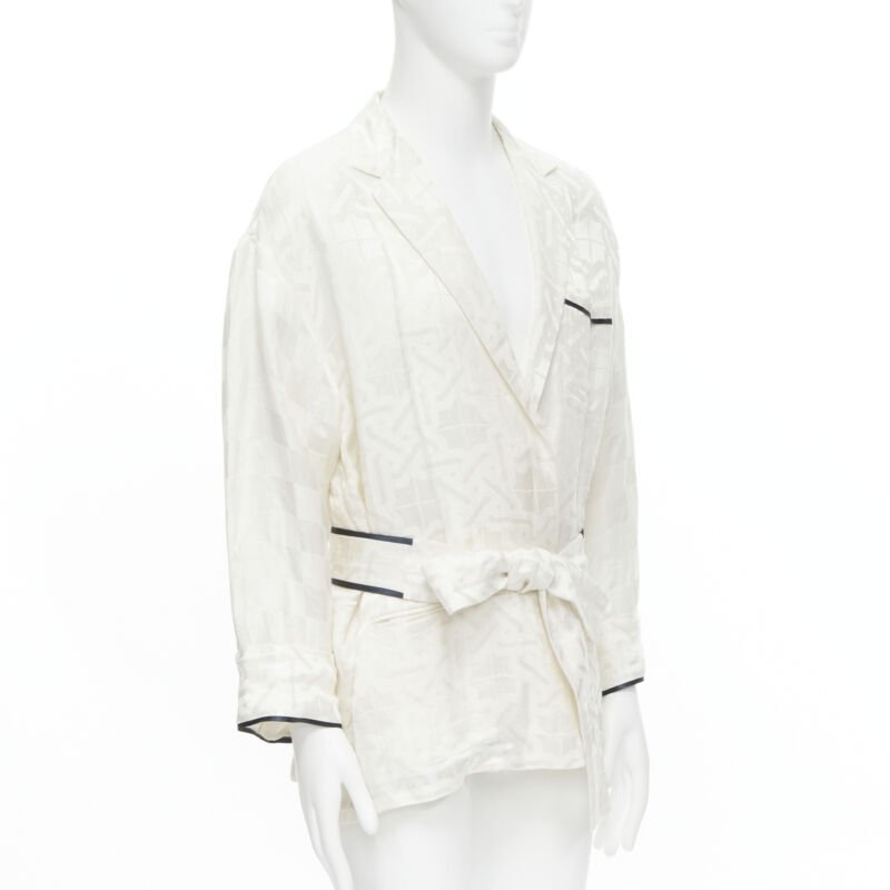 Female mannequin wearing Haider Ackermann White Linen Women Top in Size FR36 | Available at JHROP