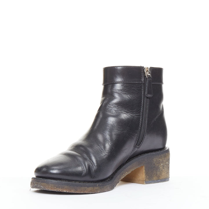 CHANEL Turnlock CC black leather silver logo crepe rubber sole ankle boots EU37
