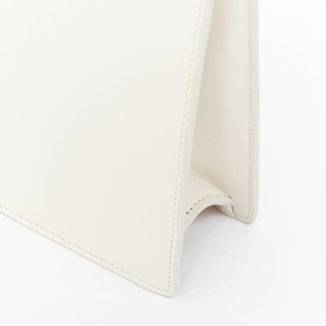 SAINT LAURENT Lutetia gold bar off white smooth leather clutch bag