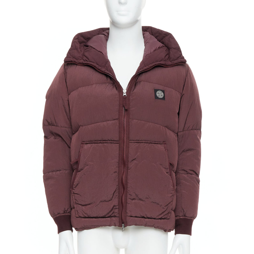 Male mannequin wearing Stone Island Purple Nylon Men Puffer Jacket in Size  M | Available at JHROP