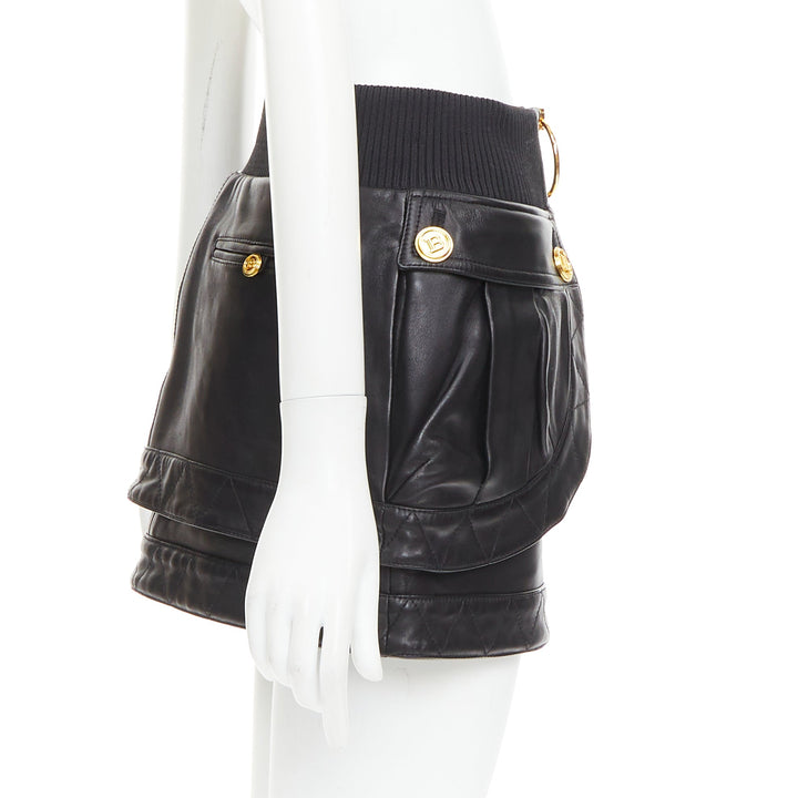 rare BALMAIN black lambskin leather gold B logo button bomber mini skirt FR34 XS