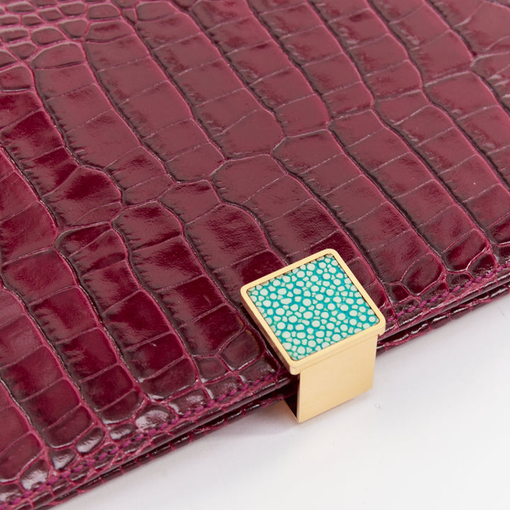SMYTHSON Mara burgundy croc embossed high gloss teal clasp passport cover