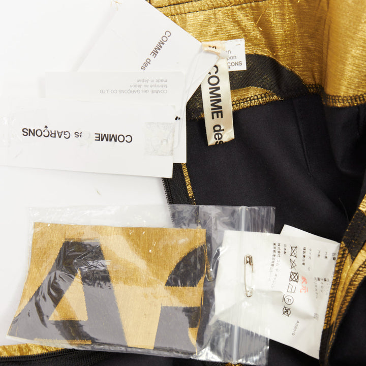 COMME DES GARCONS 2020 Runway gold black polyester silk logo cut out shorts M