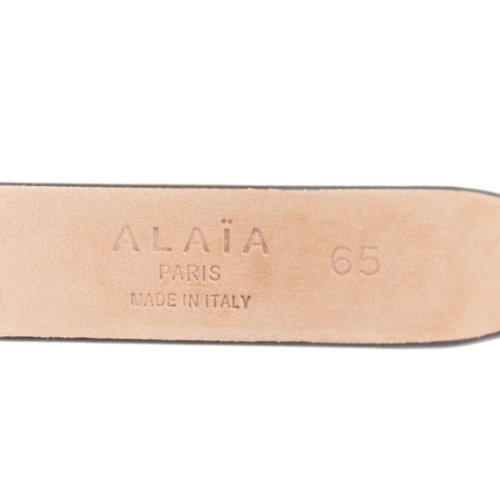 ALAIA Ovale black studded smooth calfskin leather waist belt grommet 65cm