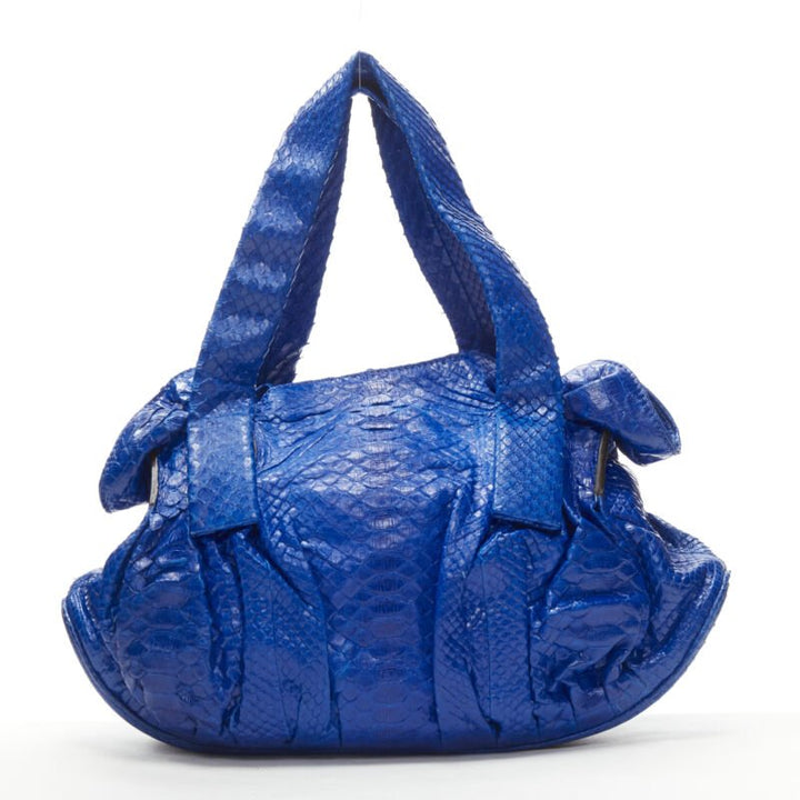 Female mannequin wearing Zagliani Blue Leather Women Bag in Size  | Available at JHROP