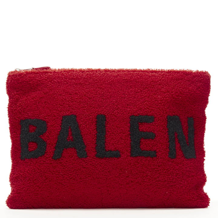 BALENCIAGA Demna logo red black dyed merino lamb shearling zip clutch bag