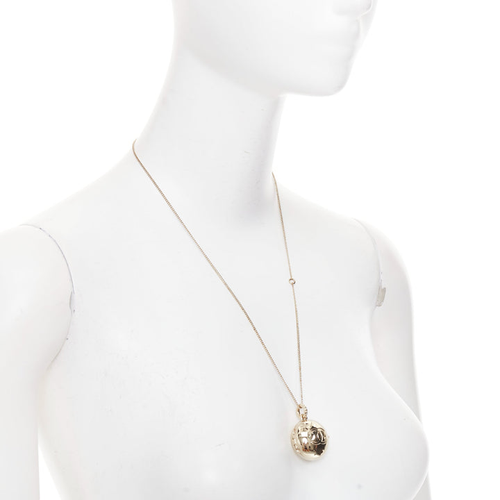 CHANEL B21S champagne gold tone CC logo clasp locket pendent necklace