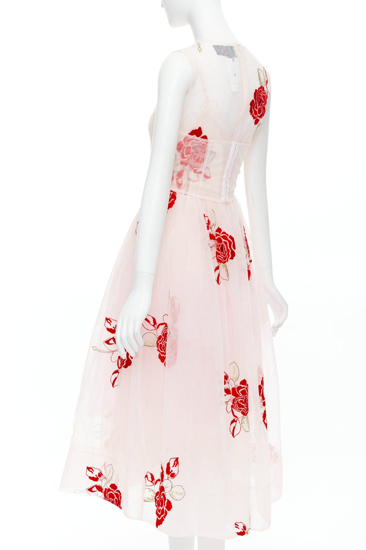 Female mannequin wearing Simone Rocha AW2020 Runway Red Polyamide Women Cocktail Dresses in Size UK8 | Available at JHROP