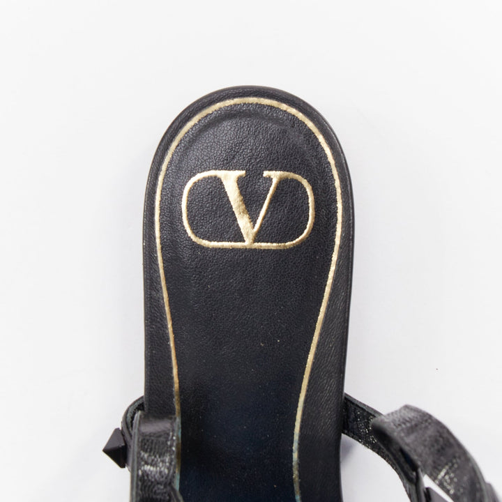 VALENTINO Rockstud black leather wraparound lace up tassel gladiator flats EU38