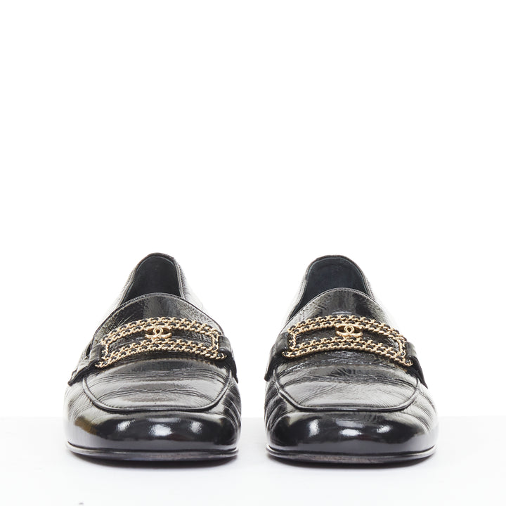 CHANEL 2025 black textured calfski gold CC chain link mocassin loafer shoes EU37