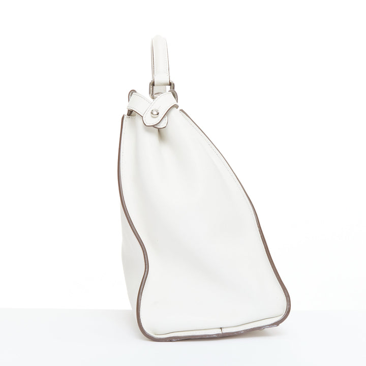 FENDI Peekaboo off white leather silver hardware Bug Monster fur eye lined bag