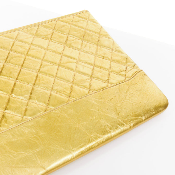 CHANEL Gabrielle O-Case Large gold aged calfskin CC logo quilted clutch bag