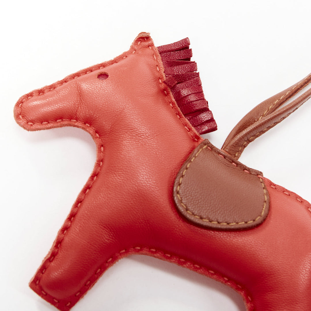 HERMES Milo Rodeo MM red leather brown trim fringed tail horse charm