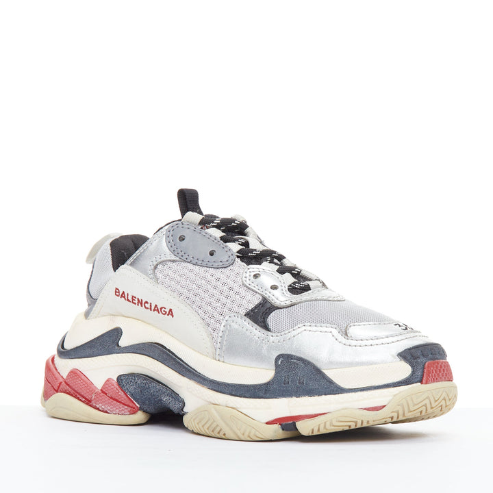 Female mannequin wearing Balenciaga by Demna Triple S Multicolour Leather Women Sneakers in Size EU36 | Available at JHROP