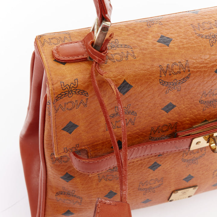 MCM Vintage Kelly cognac brown Visetos monogram GHW turnlock top handle handbag