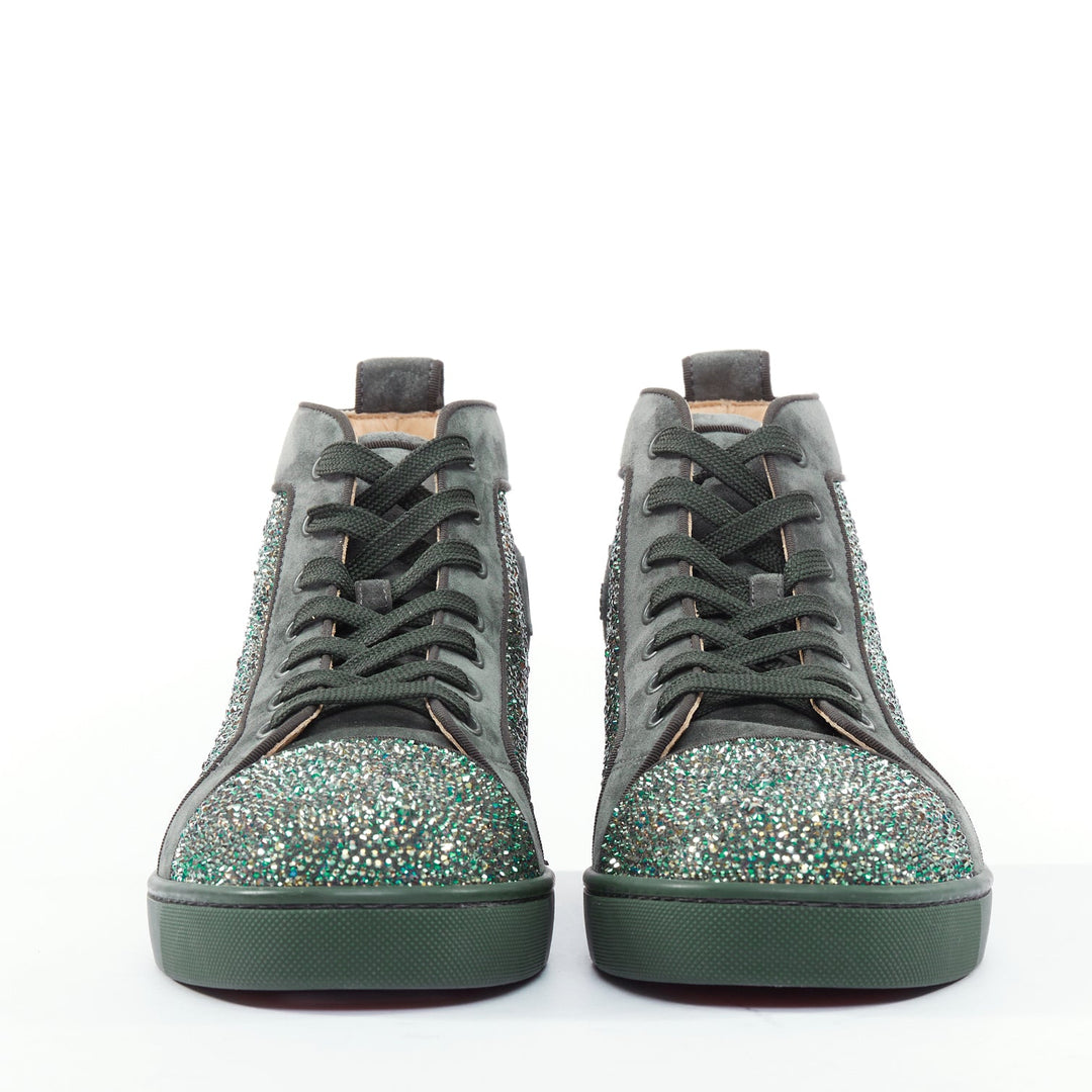 Male mannequin wearing Christian Louboutin Louis Orlato Green Suede Men Sneaker in Size EU44 | Available at JHROP