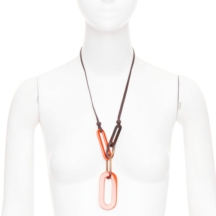 HERMES Mayance orange lacquered buffalo horn oval link pendant necklace