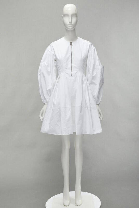 Female mannequin wearing Alexander McQueen White Cotton Women Cocktail Dresses in Size IT36 | Available at JHROP