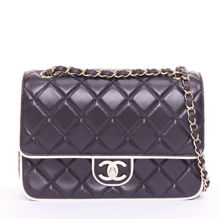 CHANEL 2025 Graphic Frame black quilted lambskin piping mini square flap bag