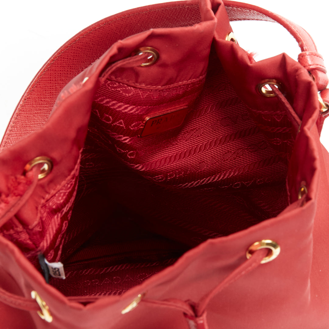 PRADA red nylon gold triangle plate drawstring bucket crossbody shoulder bag