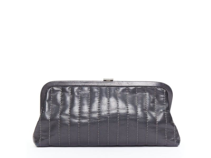 CHANEL 2005 Mademoiselle Ligne black vertical quilt lambskin kisslock clutch bag