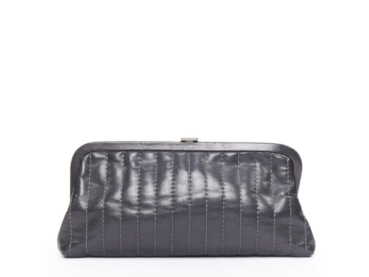 CHANEL 2005 Mademoiselle Ligne black vertical quilt lambskin kisslock clutch bag