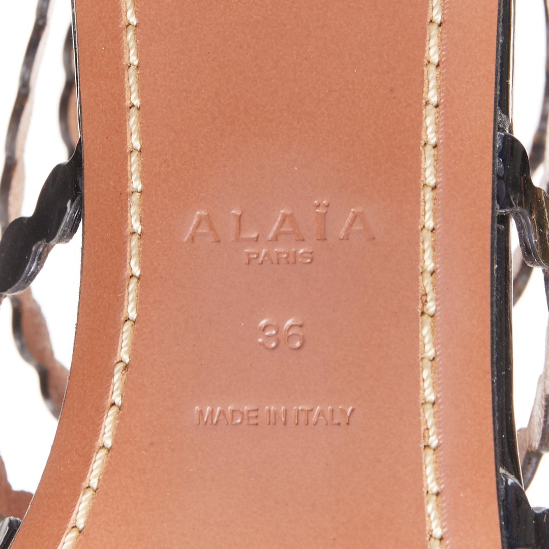 ALAIA black patent leather laser cut scalloped cage gladiator flat sandals EU36