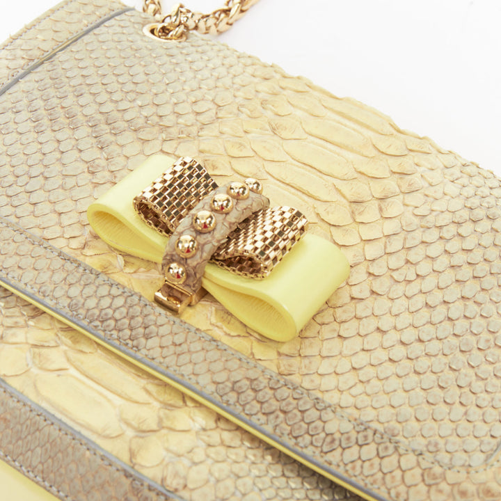 CHRISTIAN LOUBOUTIN Sweet Charity grey yellow gold stud bow chain shoulder bag