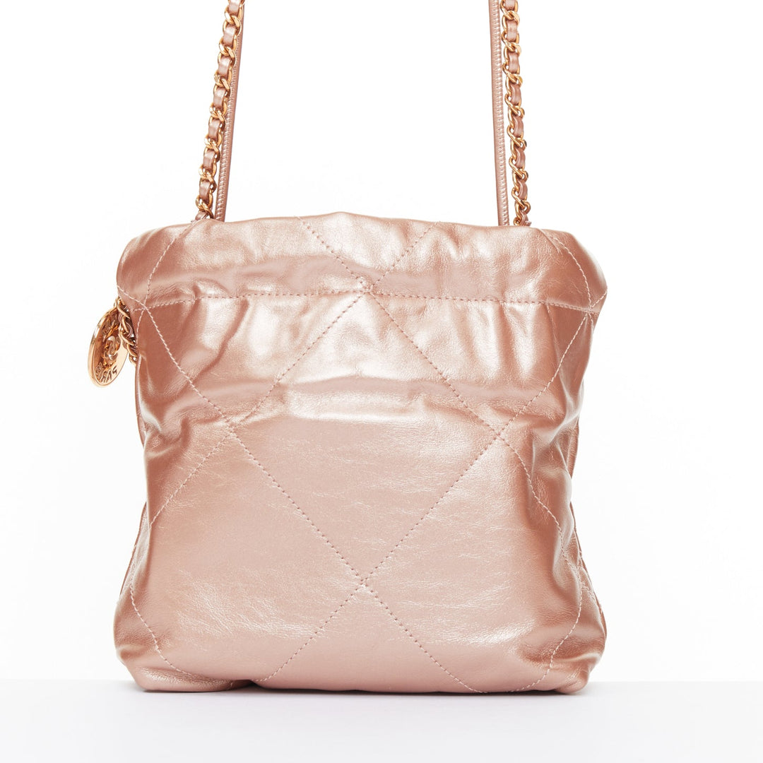 CHANEL 2023 Runway 22 Mini rose gold metallic calfskin leather drawstring bag