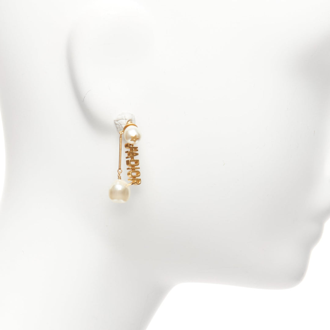 Female mannequin wearing Dior by Maria Grazia Chiuri J'adior Tribale Gold Faux Pearl Women Jewelry Earring in Size  | Available at JHROP