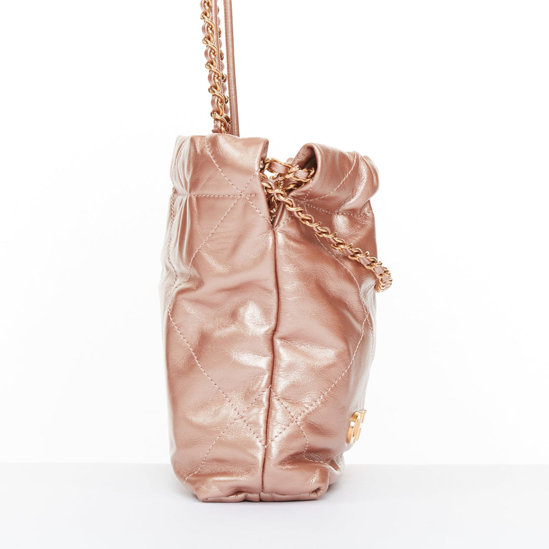 CHANEL 2023 Runway 22 Mini rose gold metallic calfskin leather drawstring bag