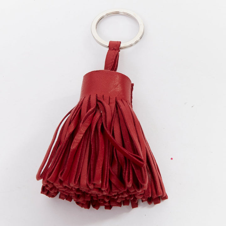 HERMES Milo Carmen red leather tassel silver ring bag charm