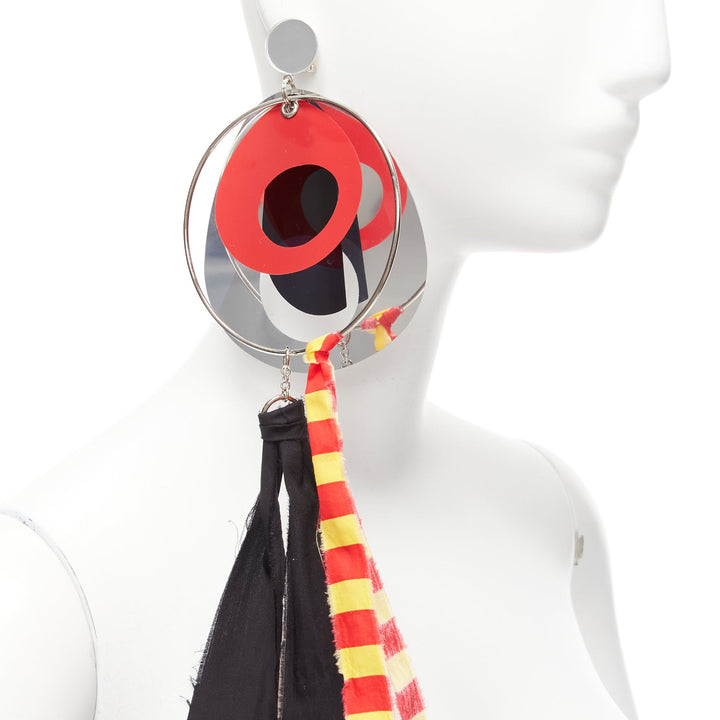 Female mannequin wearing Miu Miu by Miuccia Prada Multicolour Plastic Women Jewelry Earring in Size  | Available at JHROP