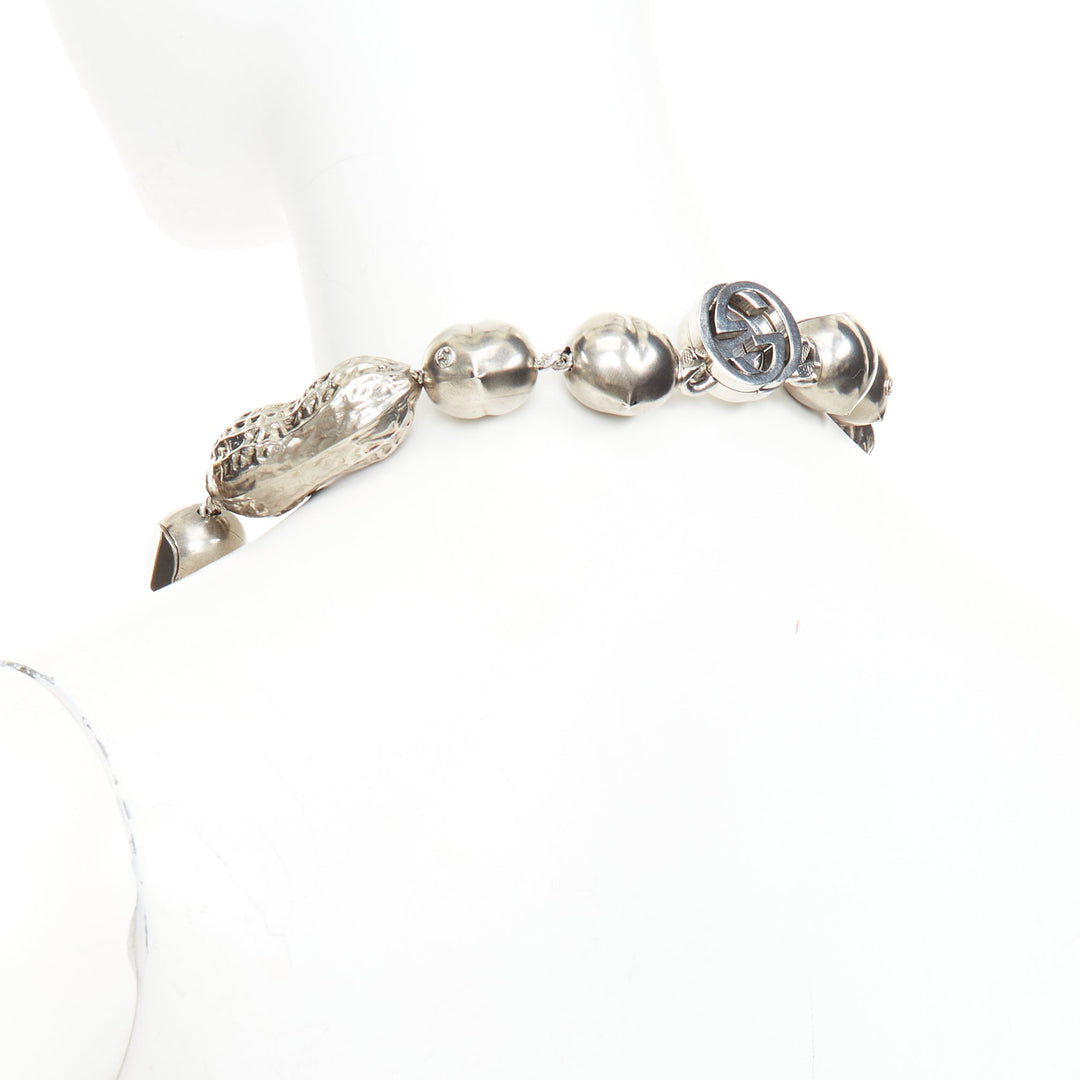 GUCCI Runway hazelnut peanut charm textured interlocking GG silver tone necklace