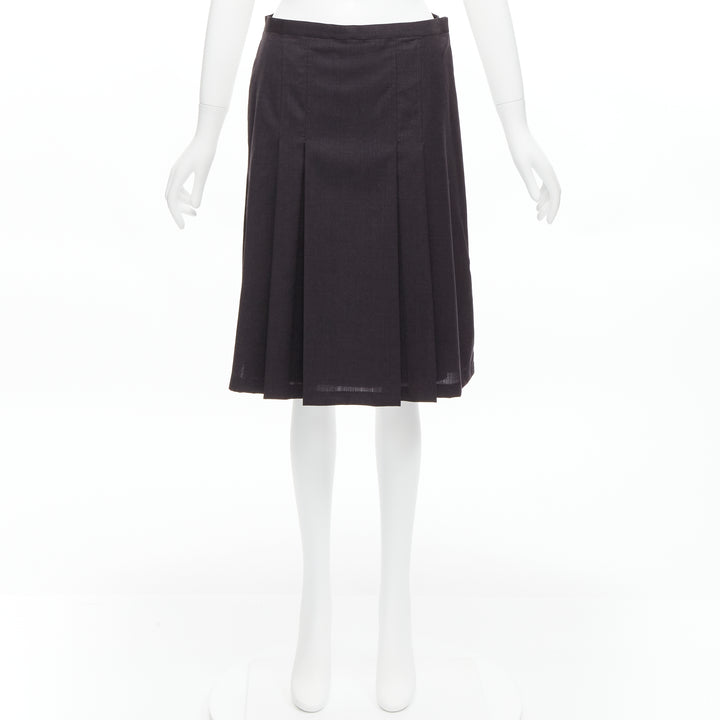 Female mannequin wearing Maison Margiela by Martin Margiela 1997 Spring Black Wool Women Skirt in Size IT42 | Available at JHROP