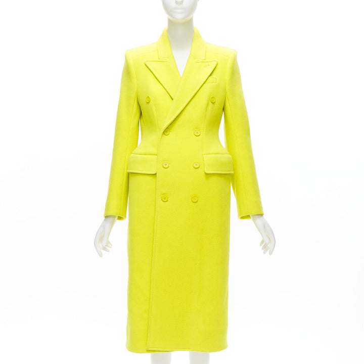 Female mannequin wearing Balenciaga by Demna 2019 Neon Green Virgin Wool Women Coat in Size FR34 | Available at JHROP