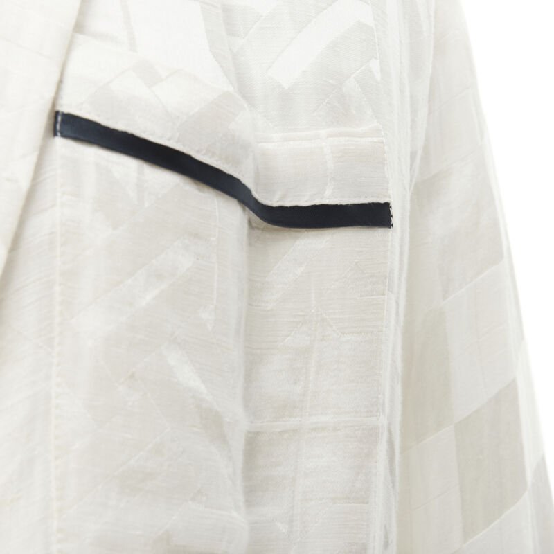 Female mannequin wearing Haider Ackermann White Linen Women Top in Size FR36 | Available at JHROP